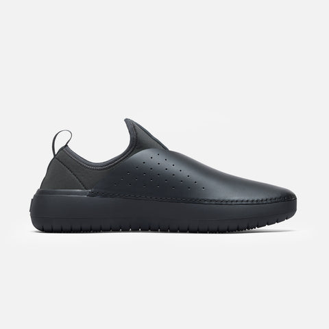 MISE black kitchen shoe medial view on a light gray background