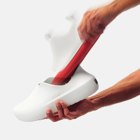 MISE All Day 2 white kitchen shoes with insole being removed by hand