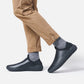 MISE Standard black leather non-slip kitchen shoes, on foot side view
